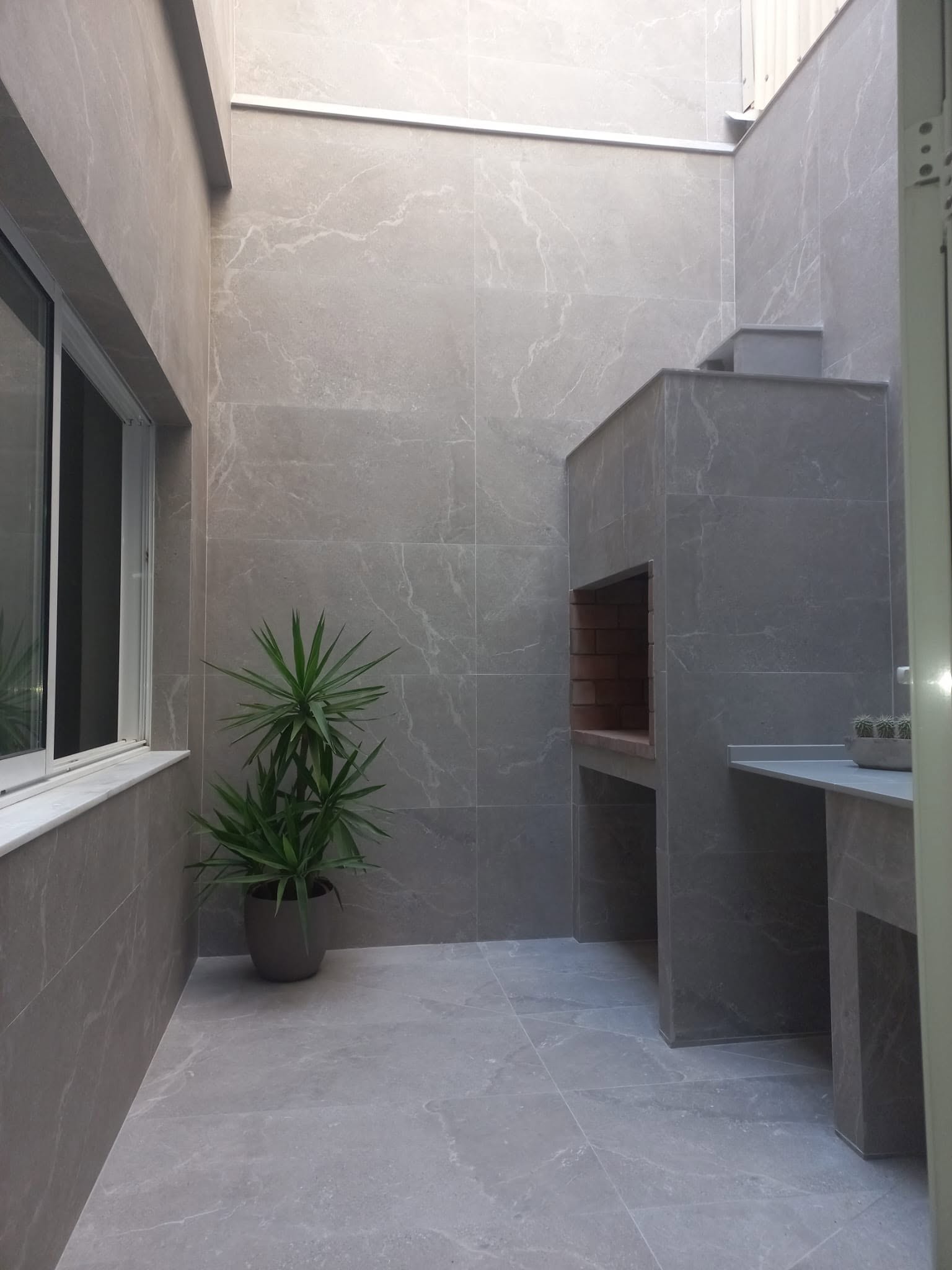Patio con barbacoa — proyecto Art I Vida